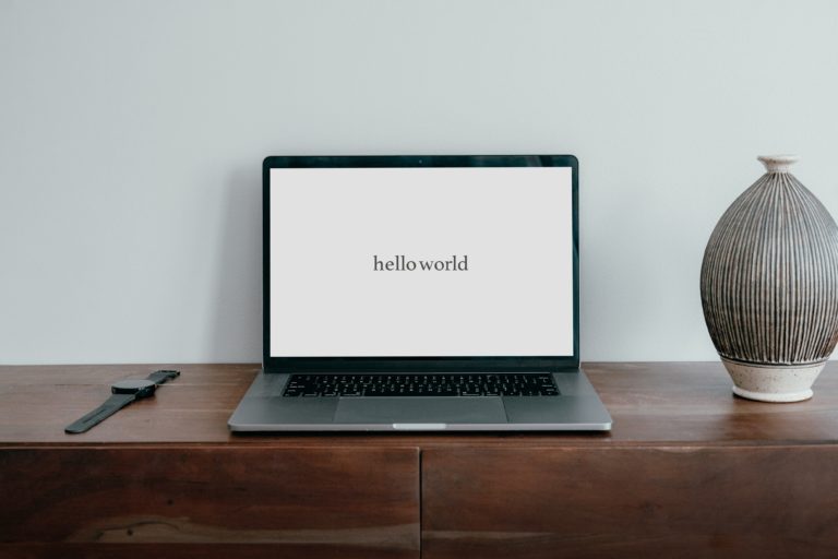 "hello world" on a laptop screen